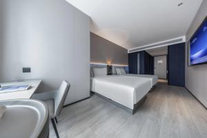 Televisyen dan/atau pusat hiburan di Atour Light Hotel Zhuhai Xiangzhou Mingzhu Station