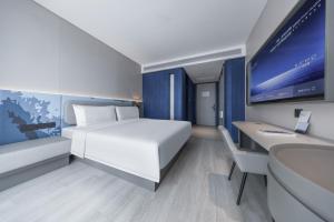 Katil atau katil-katil dalam bilik di Atour Light Hotel Zhuhai Xiangzhou Mingzhu Station