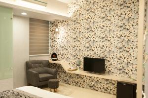TV a/nebo společenská místnost v ubytování Yesday B&B