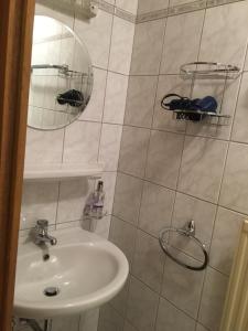 Koupelna v ubytování Haus Walser + 16 fotografií