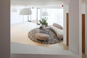 Posezení v ubytování Hotel Es Marès