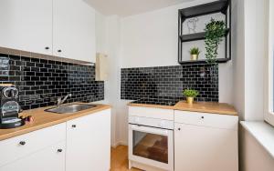 Køkken eller tekøkken på Gemütliche 2 Zimmerwohnung für 4