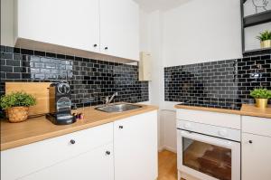 Køkken eller tekøkken på Gemütliche 2 Zimmerwohnung für 4