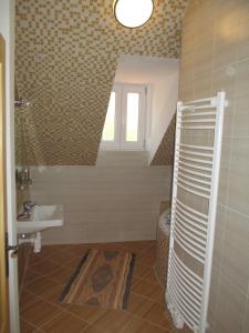 Koupelna v ubytování Penzion Pancéř