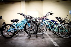a group of blue bikes parked in a garage at Coronado Beach Resort in San Diego