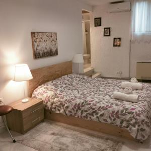Postel nebo postele na pokoji v ubytování PALIOKTIMA - SLEEP n GO
