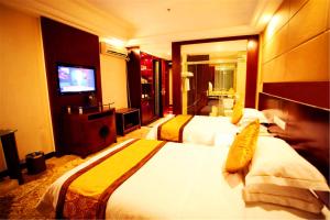 Dunhuang Tianrun International Hotel 객실 침대
