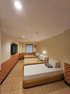 Postel nebo postele na pokoji v ubytování Ciello Accomodation