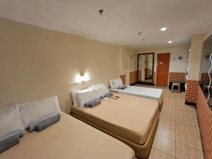 Postel nebo postele na pokoji v ubytování Ciello Accomodation