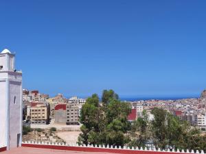 a view of a city from the roof of a building at Cozy Al Hoceima Apt, Near Beach in Al Hoceïma