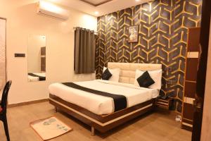 Letto o letti in una camera di Riddhi Palace