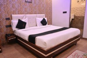 Letto o letti in una camera di Riddhi Palace
