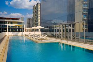 Bazén v ubytování Hotel Local Dubai at Jumeirah Village Triangle nebo v jeho okolí