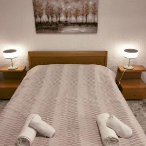 Postel nebo postele na pokoji v ubytování PALIOKTIMA - SLEEP n GO