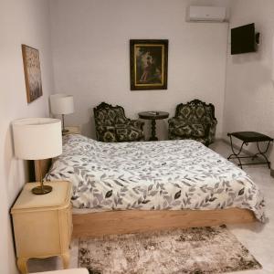 Postel nebo postele na pokoji v ubytování PALIOKTIMA - SLEEP n GO