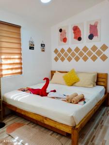Voodi või voodid majutusasutuse S&E-2 Tiny Guest House - Olango Island toas