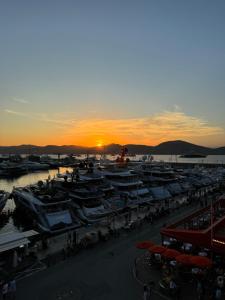 a group of boats parked in a marina at sunset at Port Saint-Tropez in Saint-Tropez