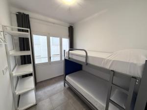 Posteľ alebo postele v izbe v ubytovaní Agi Macià Centro