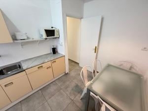 Kuchyňa alebo kuchynka v ubytovaní Agi Macià Centro