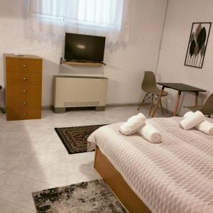 Postel nebo postele na pokoji v ubytování PALIOKTIMA - SLEEP n GO