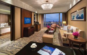 Posezení v ubytování Kangda Howard Johnson Hotel Qingdao