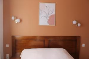 Postel nebo postele na pokoji v ubytování Hotel Etchoinia