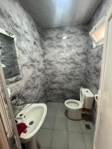 Koupelna v ubytování FIROSMANI house + 37 fotografií