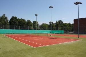 a tennis court with a net on a court at Sports Centre Haapsalu in Haapsalu
