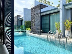 Bazén v ubytování Xen Pool Access nebo v jeho okolí