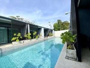 Bazén v ubytování Xen Pool Access nebo v jeho okolí
