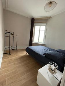 Katil atau katil-katil dalam bilik di Appartement T2 Centre Ville GS1