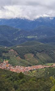 an aerial view of a small town in the mountains at ALOJAMIENTO TURISTICO LAS SOLANERAS in Solana del Pino