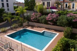 Bazén v ubytovaní 2 pièces avec clim, terrasse, piscine, 100m plage alebo v jeho blízkosti