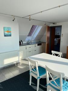 Kuchyň nebo kuchyňský kout v ubytování Haus Köbesine
