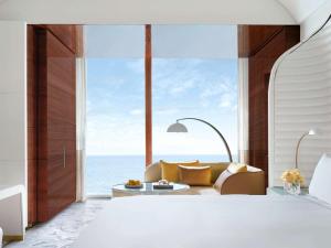 Vuode tai vuoteita majoituspaikassa Fairmont Doha