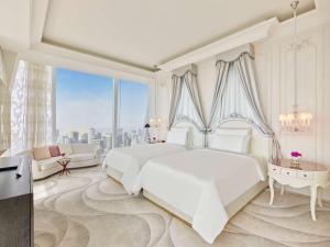 Vuode tai vuoteita majoituspaikassa Fairmont Doha