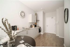 Η κουζίνα ή μικρή κουζίνα στο Modern Studio Apartment in Waterloo Liverpool