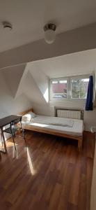 Postel nebo postele na pokoji v ubytování Low Budget Allach Apartmenthostel EVE 74