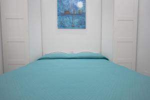 Ένα ή περισσότερα κρεβάτια σε δωμάτιο στο Aurora del Mare