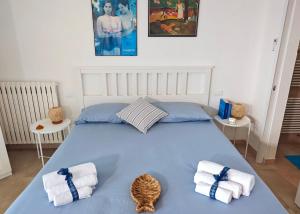 Postel nebo postele na pokoji v ubytování Casa del mare