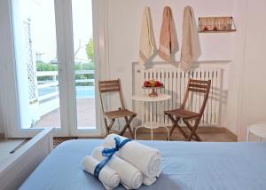 Postel nebo postele na pokoji v ubytování Casa del mare