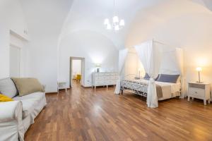 A bed or beds in a room at Corte Tiso