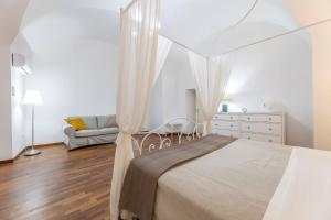 A bed or beds in a room at Corte Tiso