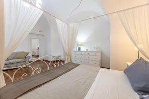 A bed or beds in a room at Corte Tiso