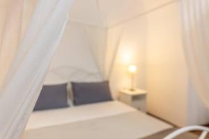 A bed or beds in a room at Corte Tiso