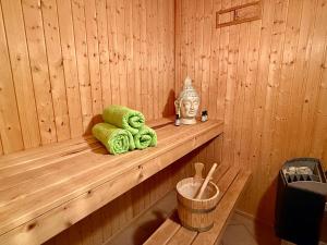 a sauna with two teddy bears sitting on a shelf at Meeresblume - Baabe in Baabe