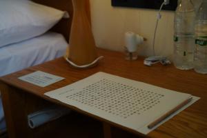 Voodi või voodid majutusasutuse Taihua Wutong Hotel toas
