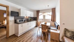 Kuchyň nebo kuchyňský kout v ubytování Appartement Treffpunkt