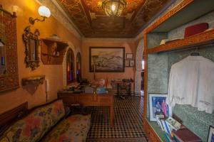 Posezení v ubytování Riad Alhambra