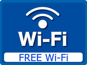 旭川的住宿－旭川特倫德酒店，上面有WiFi标志的蓝色标志